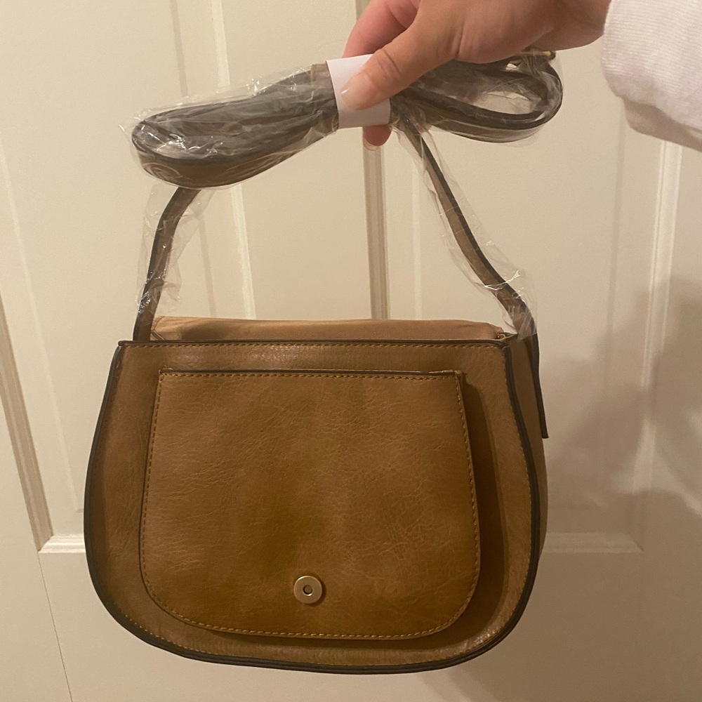NWT small chocolate brown purse with a shoulder strap